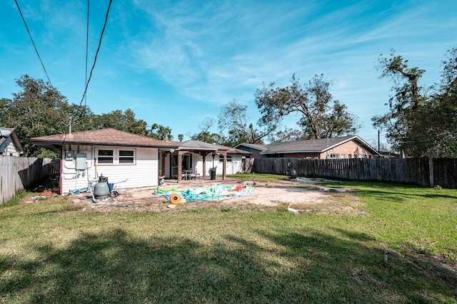 204 Carnation St, Lake Jackson, TX 77566 - back of property featuring a patio area