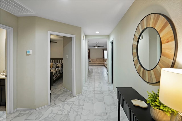 15482 Sicomoro Viejo St, Channelview, TX 77530 - corridor with light marble finish flooring, recessed lighting, and baseboards