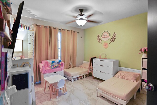 15482 Sicomoro Viejo St, Channelview, TX 77530 - bedroom featuring light marble finish floors and a ceiling fan