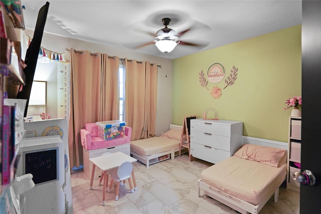 15482 Sicomoro Viejo St, Channelview, TX 77530 - bedroom with light marble finish floors and a ceiling fan