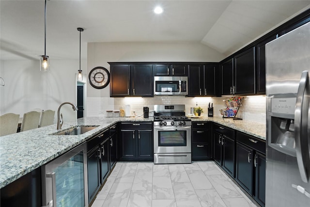 15482 Sicomoro Viejo St, Channelview, TX 77530 - kitchen with stainless steel appliances, a sink, beverage cooler, light stone counters, and light marble finish floors