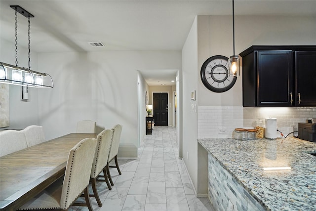 15482 Sicomoro Viejo St, Channelview, TX 77530 - dining area featuring light marble finish flooring and baseboards