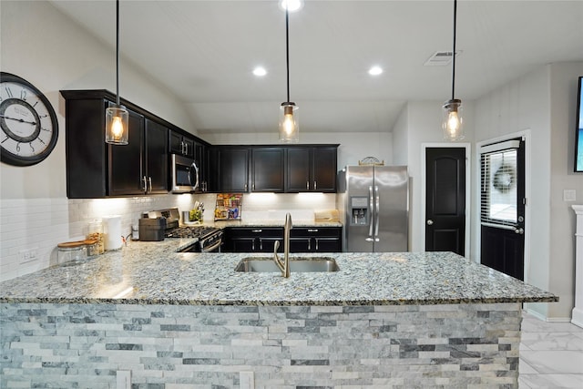 15482 Sicomoro Viejo St, Channelview, TX 77530 - kitchen featuring appliances with stainless steel finishes, a sink, light stone countertops, light marble finish flooring, and tasteful backsplash