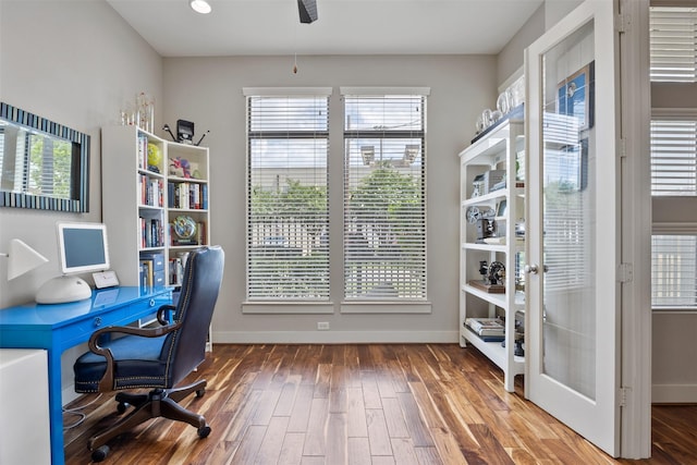 3909 Rose St, Houston, TX 77007 - office with wood finished floors, baseboards, and ceiling fan