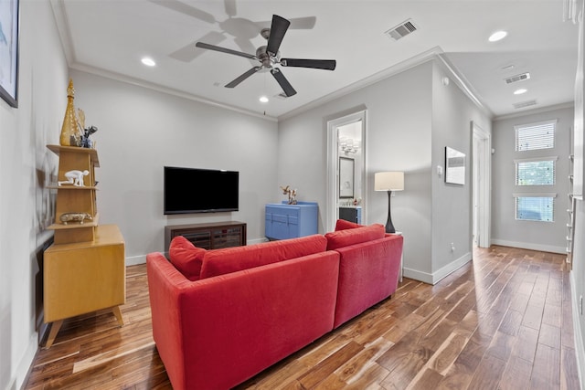 3909 Rose St, Houston, TX 77007 - living area featuring crown molding, wood finished floors, baseboards, recessed lighting, and a ceiling fan