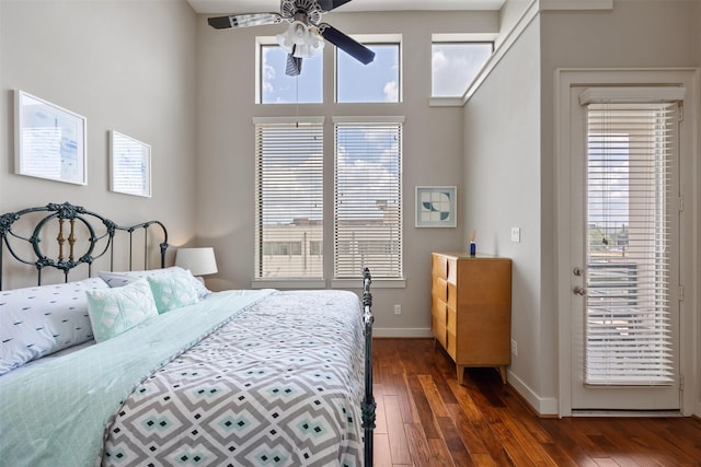 3909 Rose St, Houston, TX 77007 - bedroom with multiple windows, dark wood-style flooring, and baseboards