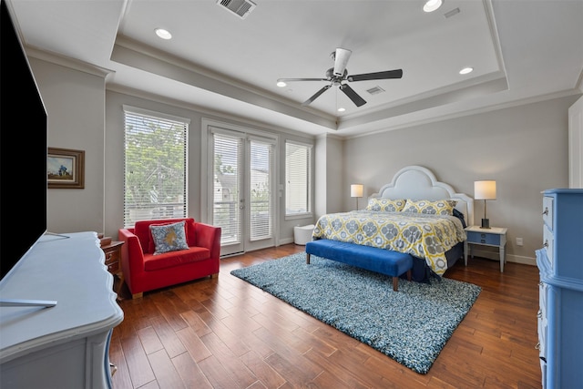 3909 Rose St, Houston, TX 77007 - bedroom with a tray ceiling, access to exterior, crown molding, wood finished floors, and baseboards