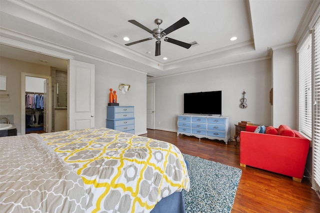 3909 Rose St, Houston, TX 77007 - bedroom with wood finished floors, recessed lighting, a tray ceiling, a closet, and a ceiling fan
