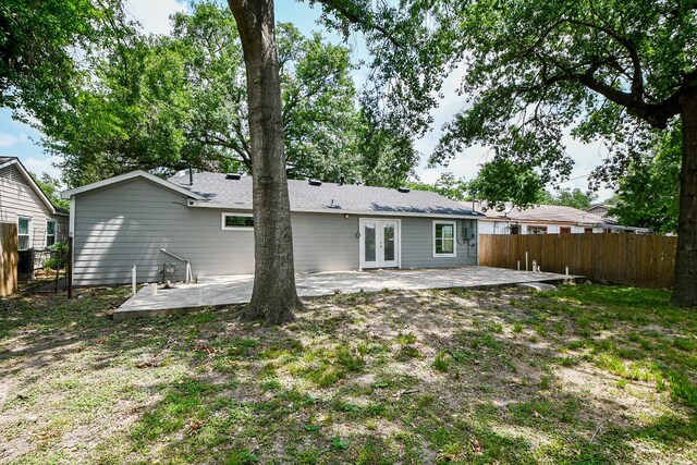 44 Farrell St, Houston, TX 77022 - rear view of house featuring french doors and a patio area