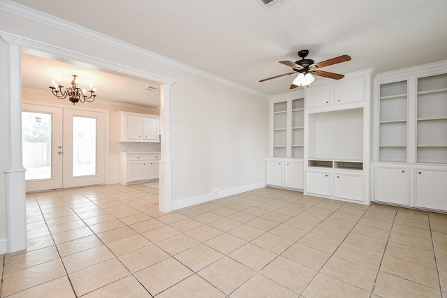 44 Farrell St, Houston, TX 77022 - empty room featuring light tile patterned floors, crown molding, a chandelier, built in features, and ceiling fan