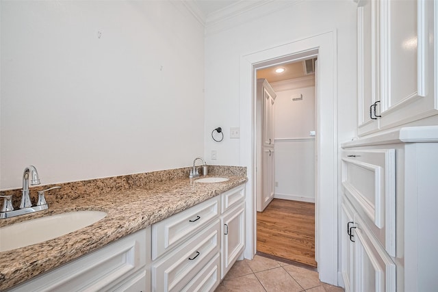 901 W 21st St, Houston, TX 77008 - full bathroom with crown molding, tile patterned floors, and double vanity