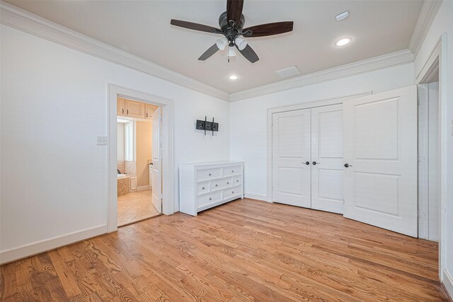 901 W 21st St, Houston, TX 77008 - unfurnished bedroom featuring crown molding, light wood-type flooring, recessed lighting, a closet, and ensuite bathroom