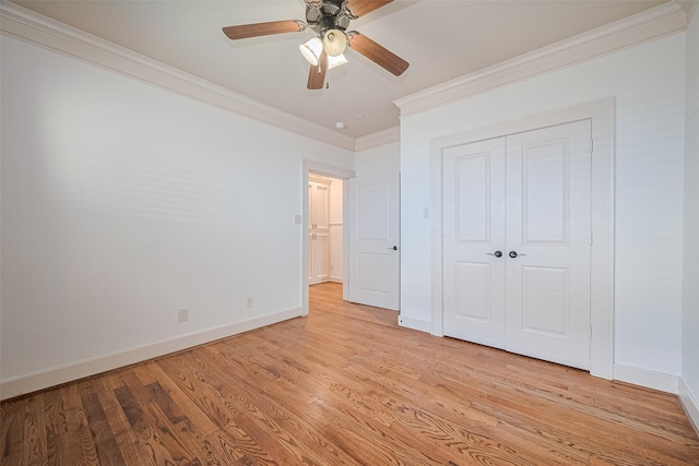 901 W 21st St, Houston, TX 77008 - unfurnished bedroom with ornamental molding, light wood-style flooring, a closet, and a ceiling fan