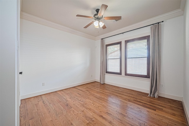 901 W 21st St, Houston, TX 77008 - empty room featuring ornamental molding, light wood-type flooring, baseboards, and a ceiling fan