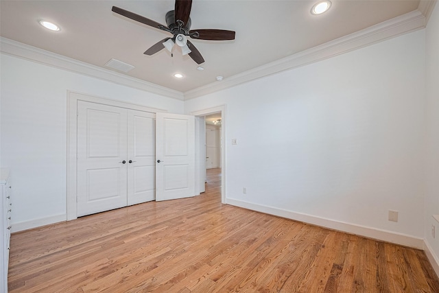 901 W 21st St, Houston, TX 77008 - unfurnished bedroom with crown molding, light wood-type flooring, a closet, recessed lighting, and ceiling fan