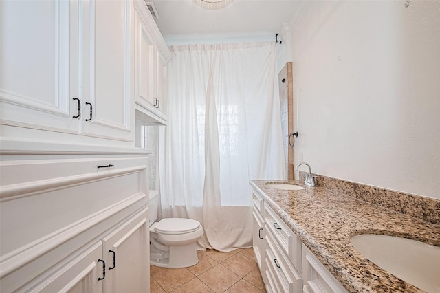 901 W 21st St, Houston, TX 77008 - bathroom with double vanity, tile patterned flooring, and shower / tub combo with curtain