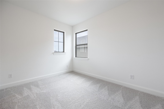 825 Coronado Terrace Ln, Katy, TX 77493 - unfurnished room featuring baseboards and carpet