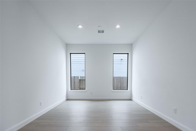 825 Coronado Terrace Ln, Katy, TX 77493 - unfurnished room with recessed lighting and wood finished floors