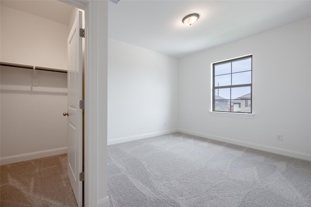 825 Coronado Terrace Ln, Katy, TX 77493 - unfurnished bedroom featuring carpet floors and baseboards