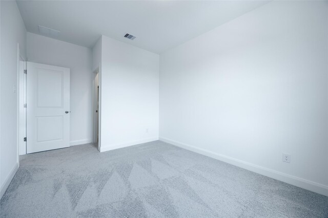 825 Coronado Terrace Ln, Katy, TX 77493 - spare room featuring carpet and baseboards
