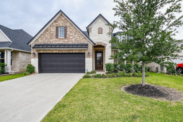 2234 Clements Shore Ln, La Porte, TX 77571 - french provincial home featuring concrete driveway, a front lawn, stone siding, and a garage
