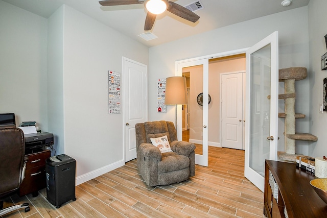 2234 Clements Shore Ln, La Porte, TX 77571 - home office with french doors, ceiling fan, light wood finished floors, and baseboards