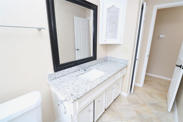 3911 Hermitage Hollow Ln, Houston, TX 77339 - bathroom with vanity, toilet, tile patterned floors, and baseboards