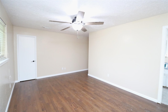 3911 Hermitage Hollow Ln, Houston, TX 77339 - spare room featuring ceiling fan, wood finished floors, baseboards, and a textured ceiling