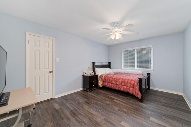 15607 Ensenada Dr, Houston, TX 77083 - bedroom with dark wood-style flooring, baseboards, and ceiling fan
