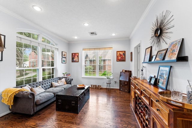 4807 Louisa Ct, Sugar Land, TX 77478 - living area featuring wood finished floors, recessed lighting, ornamental molding, a textured ceiling, and baseboards