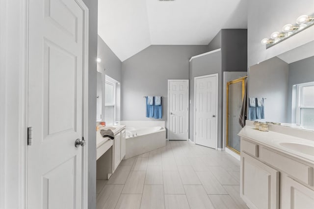 4807 Louisa Ct, Sugar Land, TX 77478 - bathroom with a stall shower, a bath, vanity, and vaulted ceiling