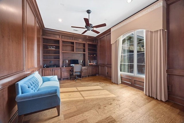 2319 Wyndam Heights Ln, Houston, TX 77077 - office with crown molding, built in study area, light wood-style floors, ceiling fan, and recessed lighting