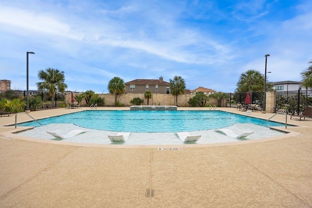 2319 Wyndam Heights Ln, Houston, TX 77077 - community pool with a patio area