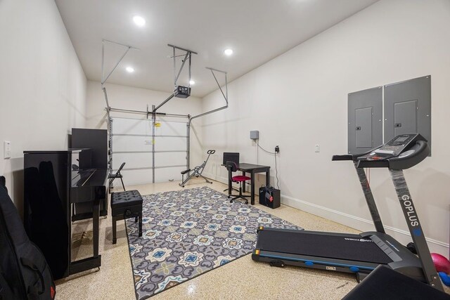 2319 Wyndam Heights Ln, Houston, TX 77077 - workout room with electric panel, recessed lighting, a garage, and baseboards