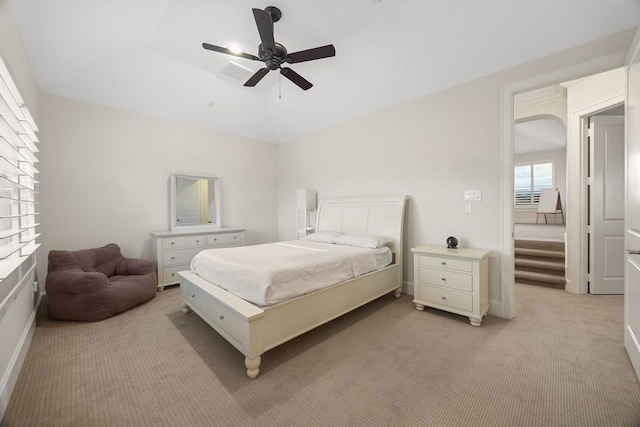2319 Wyndam Heights Ln, Houston, TX 77077 - bedroom with light colored carpet and ceiling fan