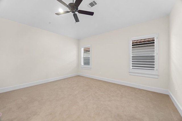 2319 Wyndam Heights Ln, Houston, TX 77077 - unfurnished room with light carpet, ceiling fan, and baseboards