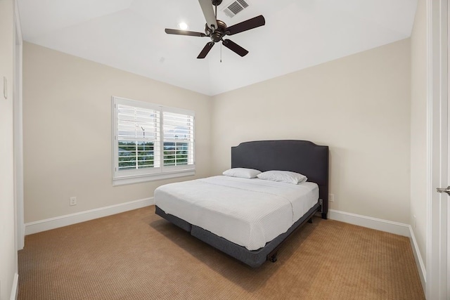 2319 Wyndam Heights Ln, Houston, TX 77077 - carpeted bedroom featuring baseboards, ceiling fan, and lofted ceiling