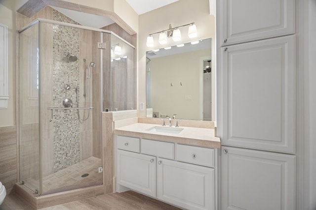 2319 Wyndam Heights Ln, Houston, TX 77077 - bathroom featuring vanity and a stall shower