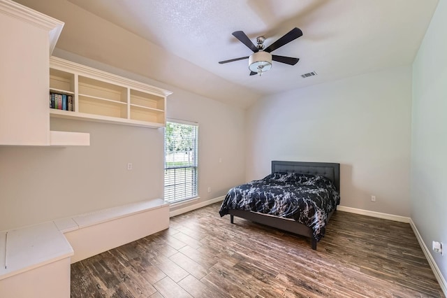 11519 Imperial Ln, Montgomery, TX 77316 - bedroom with dark wood-type flooring, baseboards, lofted ceiling, and a ceiling fan