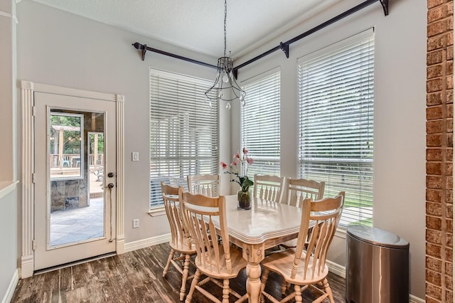 11519 Imperial Ln, Montgomery, TX 77316 - dining area featuring dark wood-style floors and baseboards