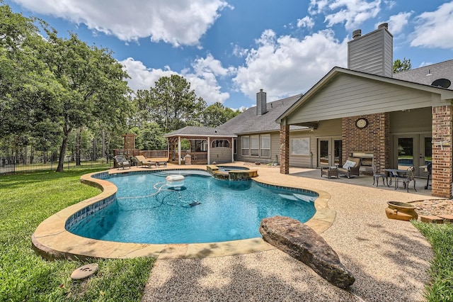 11519 Imperial Ln, Montgomery, TX 77316 - view of pool with french doors, a patio, and a pool with connected hot tub
