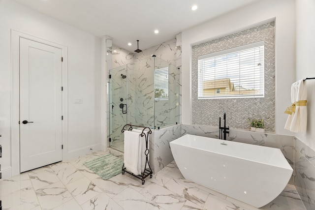 1433 Alexander St, Houston, TX 77008 - bathroom featuring a marble finish shower, recessed lighting, a freestanding tub, and marble finish flooring