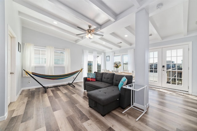 196 Barracuda St, Bayou Vista, TX 77563 - living area with beamed ceiling, wood finished floors, baseboards, french doors, and recessed lighting