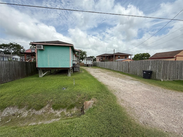 613 24th St, San Leon, TX 77539 - view of yard featuring driveway
