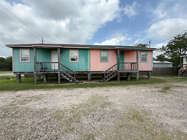 613 24th St, San Leon, TX 77539 - view of front of property with stairway