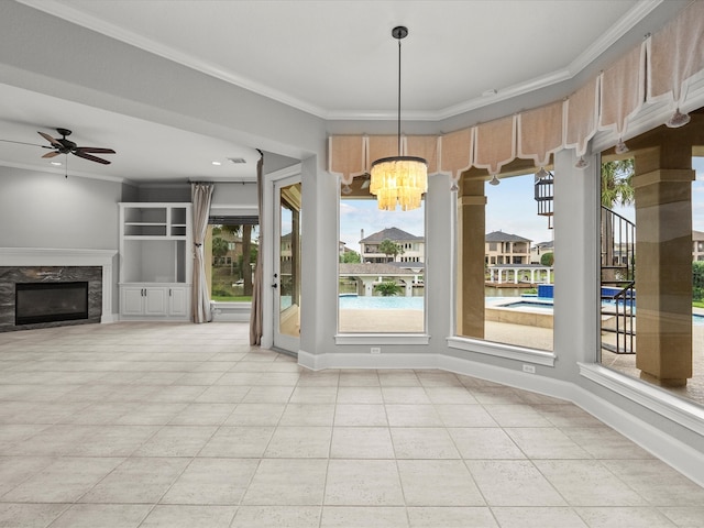 2905 Sea Channel Dr, Seabrook, TX 77586 - unfurnished dining area featuring a chandelier, crown molding, healthy amount of natural light, light tile patterned floors, and baseboards