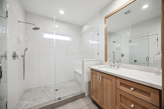 2218 Gardenia Dr, Houston, TX 77018 - bathroom with a stall shower, vanity, and tile patterned flooring