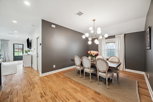 2218 Gardenia Dr, Houston, TX 77018 - dining room with a chandelier, light wood-type flooring, baseboards, recessed lighting, and vaulted ceiling