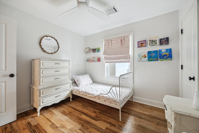 2218 Gardenia Dr, Houston, TX 77018 - bedroom featuring wood finished floors, baseboards, and a ceiling fan