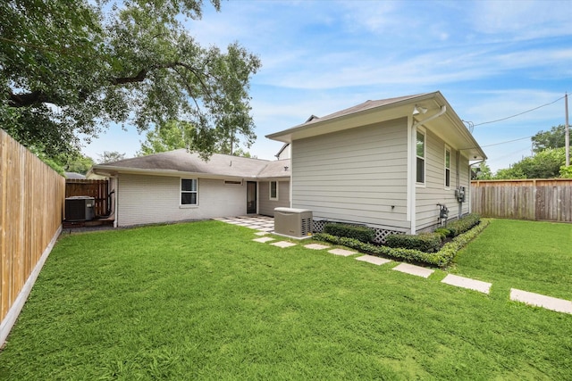2218 Gardenia Dr, Houston, TX 77018 - rear view of property featuring central AC unit and a patio